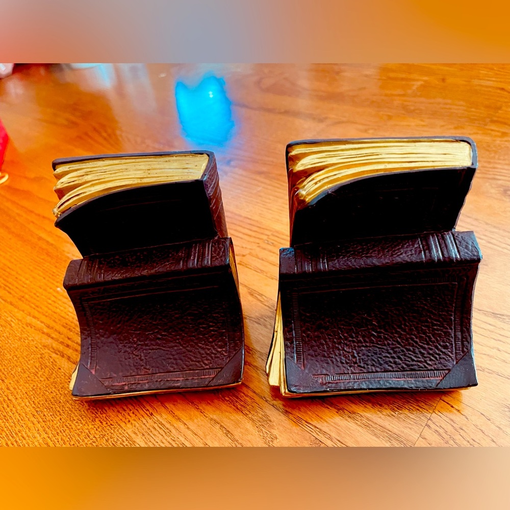 A pair of metal books bookends